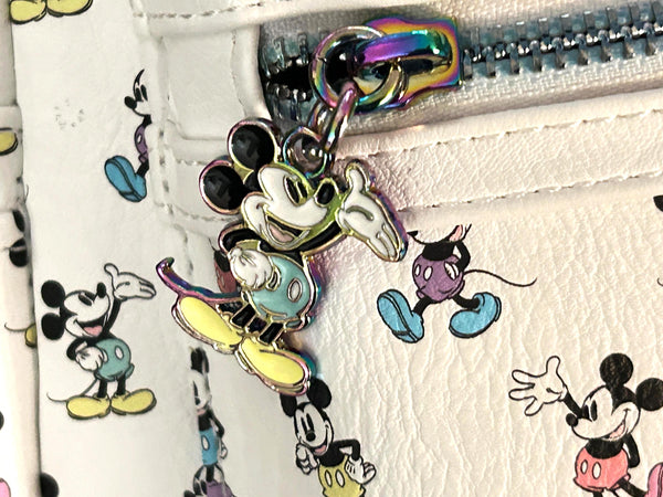 Enjoy the exclusive, pastel rainbow charm of our Loungefly Disney Pastel Rainbow Mickey Mouse Mini Backpack. Adjustable straps add comfort. Very hard to find