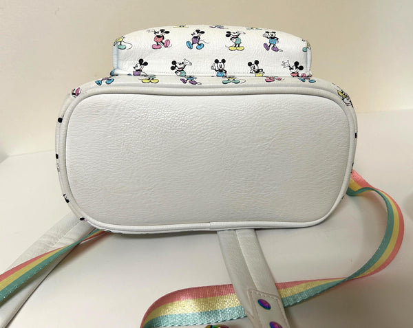 Enjoy the exclusive, pastel rainbow charm of our Loungefly Disney Pastel Rainbow Mickey Mouse Mini Backpack. Adjustable straps add comfort. Very hard to find