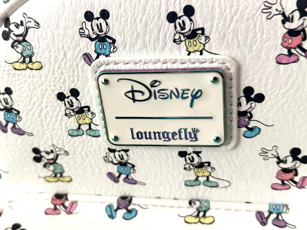  Enjoy the exclusive, pastel rainbow charm of our Loungefly Disney Pastel Rainbow Mickey Mouse Mini Backpack. Adjustable straps add comfort. Very hard to find