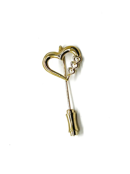 This sweet retro heart stick pin is so charming! It has an openwork design with three smaller hearts along the side. These pins were super popular in the 70s and 80s, perfect for sweaters, blazers, or even scarves. It's 1.5" long and in great shape!