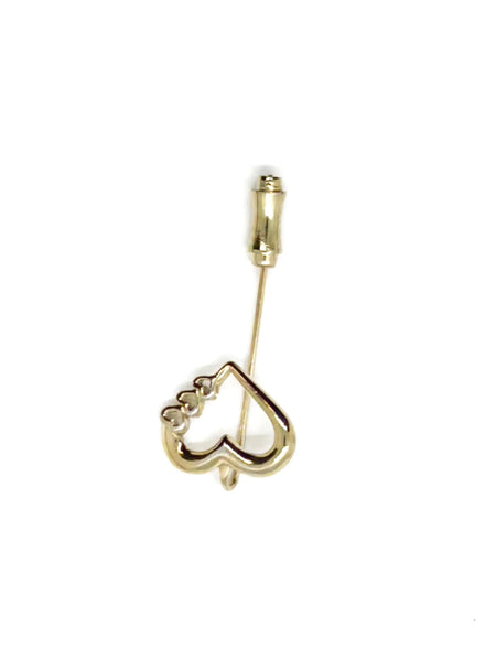 This sweet retro heart stick pin is so charming! It has an openwork design with three smaller hearts along the side. These pins were super popular in the 70s and 80s, perfect for sweaters, blazers, or even scarves. It's 1.5" long and in great shape!