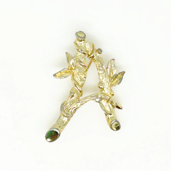 Sarah Coventry Initial "A" Vintage Brooch (1964) - Showcase timeless style with this gold-toned bamboo-look initial brooch. Signed SarahCov and measures 2". Shop now!