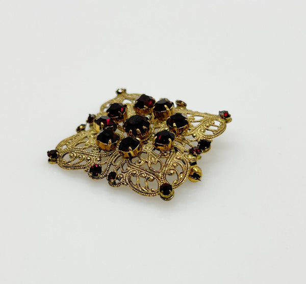 Intricate Vintage Gold Tone Brooch with Ruby Red Stones - Lamoree’s Vintage