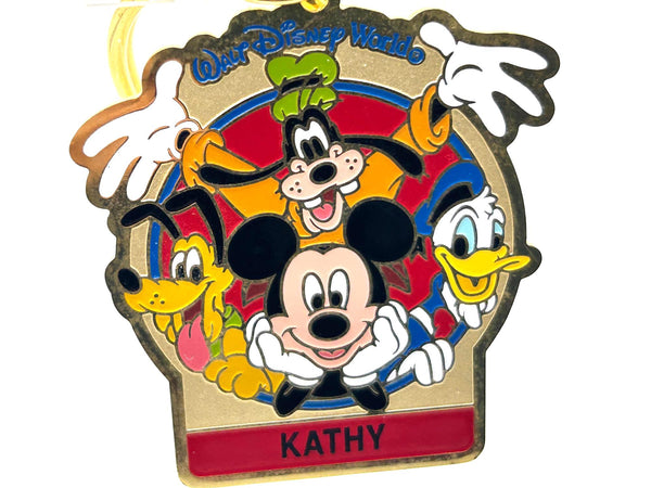 Vintage Walt Disney World You're Special enamel keychain featuring Mickey Mouse, Goofy, Pluto, and Donald Duck with a personalized Kathy nameplate