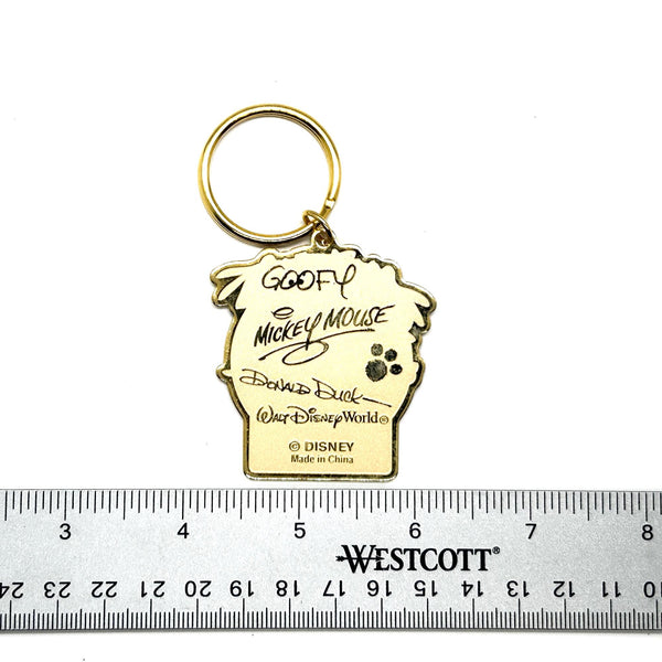 Vintage Walt Disney World You're Special metal key chain featuring Mickey, Pluto, Goofy, and Donald Duck with Kathy nameplate