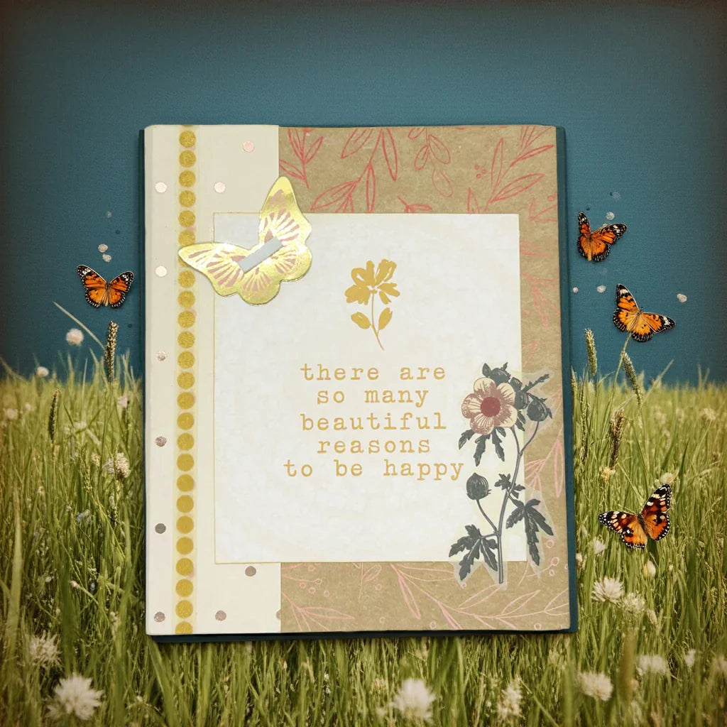 This handmade mixed media "Beautiful Reasons" album is a charming, butterfly-themed mini journal crafted with care and creativity. Featuring soothing shades of sand, olive green, and subtle red accents, it invites you to capture your most special memories and inspirations.