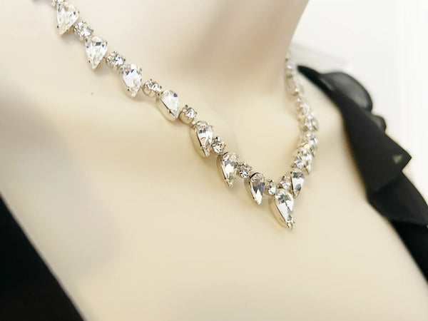 Discover the magic of this stunning vintage Superb Kramer Rhinestone Necklace, where icy brilliance meets timeless elegance. 