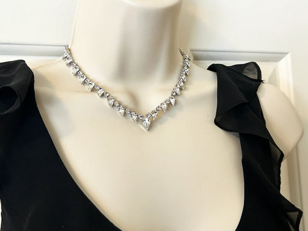Discover the magic of this stunning vintage Superb Kramer Rhinestone Necklace, where icy brilliance meets timeless elegance. 