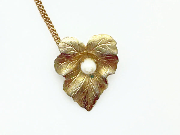 Discover the charm of mid-century elegance with this authentic pair of&nbsp; Sarah Coventry "Chit-Chat" sweater guards from the late 1950s.