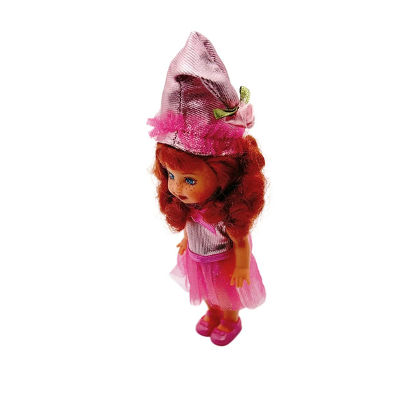 Kelly appears as Lullaby Munchkin doll from The Wizard of Oz collection. This charming figure dressed as the iconic Lullaby Munchkin character.
