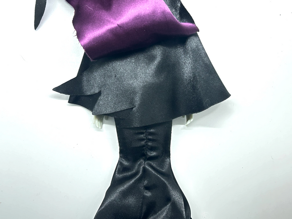 Disney Store Maleficent 12-inch classic fashion doll wearing her iconic black and burgundy robe with curved horns headpiece, isolated on a solid white background.
