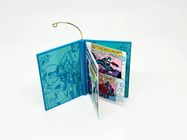 This 4th and final ornament in the series, beautifully handcrafted and dated 2011, is a tribute to the comic book heroes of Captain America and The Avengers. Unleash your inner superhero with this exclusive, limited edition ornament! Crafted in 2011, QX8819,&nbsp;designed by Robert Chad, this collectible is the perfect tribute to Captain America and The Avengers.