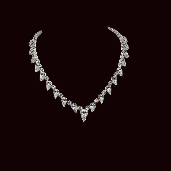 Discover the magic of this stunning vintage Superb Kramer Rhinestone Necklace, where icy brilliance meets timeless elegance. 
