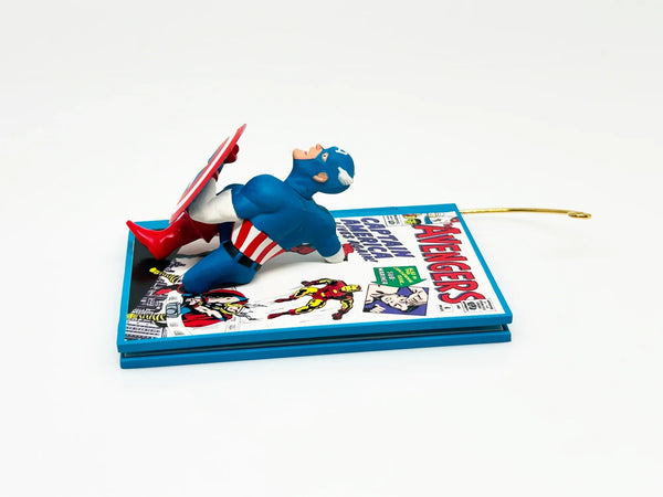 This 4th and final ornament in the series, beautifully handcrafted and dated 2011, is a tribute to the comic book heroes of Captain America and The Avengers. Unleash your inner superhero with this exclusive, limited edition ornament! Crafted in 2011, QX8819,designed by Robert Chad, this collectible is the perfect tribute to Captain America and The Avengers.