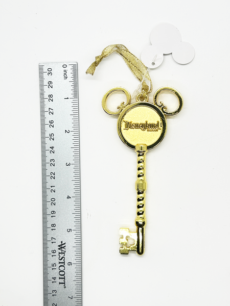 Perfect for Disney fans and collectors: our Walt Disney Parks Disneyland Sleeping Beauty Golden Castle Key Ornament provides a charming, golden keepsake. Shop today!