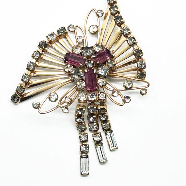 Introducing the M&amp;S 1/20 12kt G.F. Abstract Butterfly Brooch/Pendant — the perfect vintage solution to your style dilemmas. This exquisite butterfly brooch pendant highlights delicate abstract artistry paired with shimmering grey and purple/pink rhinestones