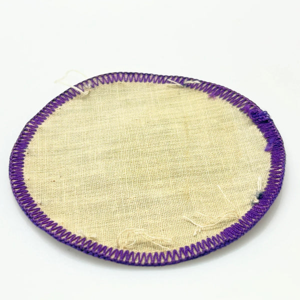 Commemorate a pivotal moment in natural history with this authentic Girl Scout Mount St. Helens patch from the early 1980s. Created in the wake of the volcano's catastrophic 1980 eruption, this Junior Girl Scout badge captures the dramatic geological event through embroidery—a volcano erupting in shades of pink against a serene blue-green sky.