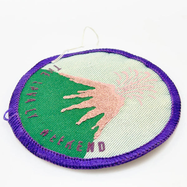 Commemorate a pivotal moment in natural history with this authentic Girl Scout Mount St. Helens patch from the early 1980s. Created in the wake of the volcano's catastrophic 1980 eruption, this Junior Girl Scout badge captures the dramatic geological event through embroidery—a volcano erupting in shades of pink against a serene blue-green sky.