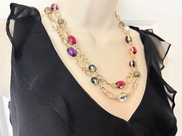 Vintage double strand station necklace with multicolor jewel-tone cabochons on a gold-tone chain link