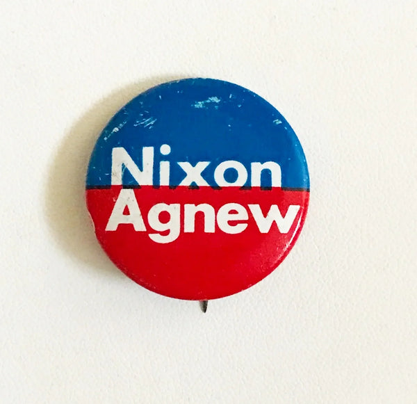Vintage button with 'Nixon Agnew' text on a white background