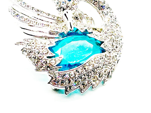 Perfect for collectors and style enthusiasts: our Showstopper Brooch provides timeless elegance and a stunning sculptural swan design. Shop today!