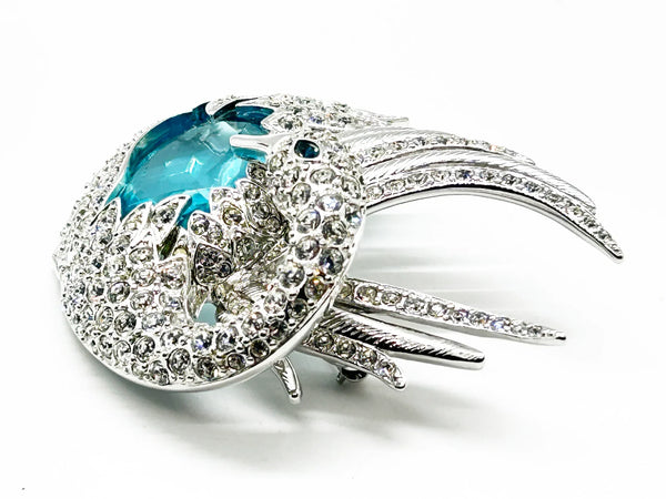 Perfect for collectors and style enthusiasts: our Showstopper Brooch provides timeless elegance and a stunning sculptural swan design. Shop today!