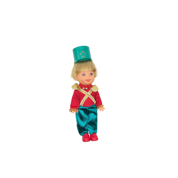 Front view of a vintage 2001 Barbie in the Nutcracker Kelly Club mini doll, Tommy as Major Mint, wearing a toy soldier uniform against a solid white background