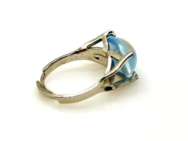 Here's our captivating vintage Sarah Coventry "Beauty Glow" ring, estimated to be from the year 1966.