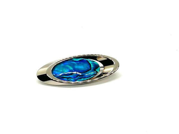 Vintage mid-century modern oval silver brooch featuring an iridescent blue and green Paua abalone shell cabochon.