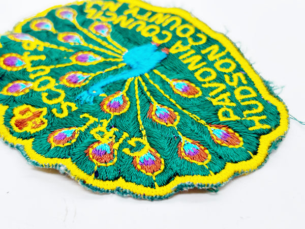 Celebrate Girl Scout heritage with this authentic vintage Pavonia Council patch from Hudson County, New Jersey. The striking peacock design served as the council's proud symbol, representing the organization's values and spirit. 