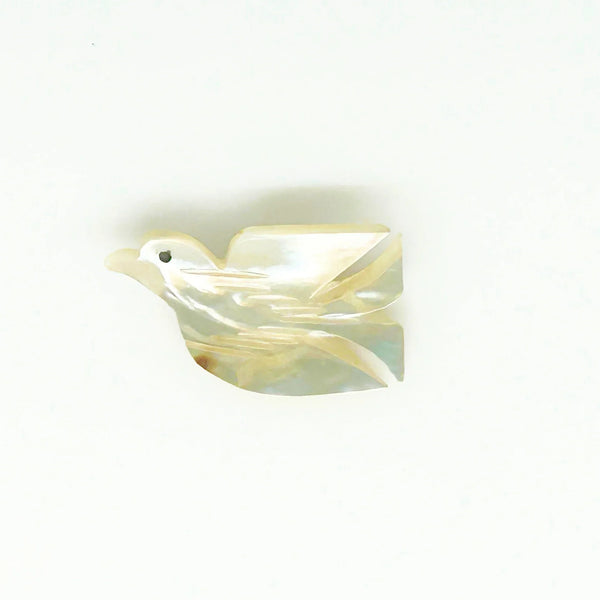 Perfect for vintage jewelry lovers: our Hand Carved Vintage Mother of Pearl Peace Dove Pin- 1960s provides a timeless symbol of peace. Shop today!