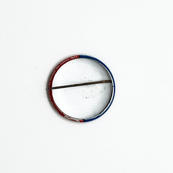 Celebrate a pivotal moment in American political history with the Nixon-Agnew Pin Back from the 1972 presidential campaign. Featuring bold red and blue colors with crisp white lettering, this vintage pin showcases the names of incumbent President Richard M. Nixon and Vice President Spiro Agnew, representing the Republican Party. 