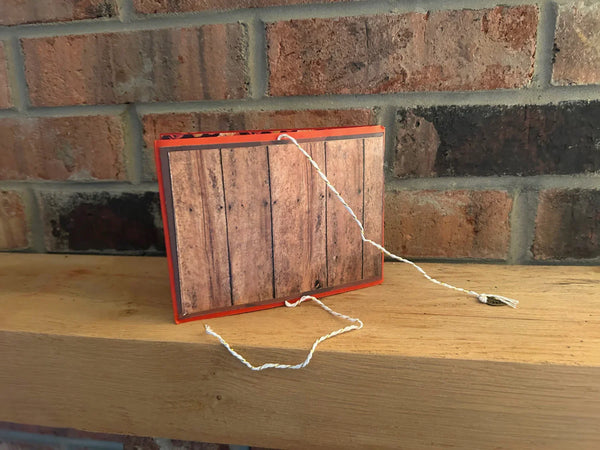 This handmade mini album captures the cozy spirit of autumn. With a warm palette of pumpkin spice, ochre, and wood grain, the album features a tempting cover hinting at a delightful caffeinated beverage. 