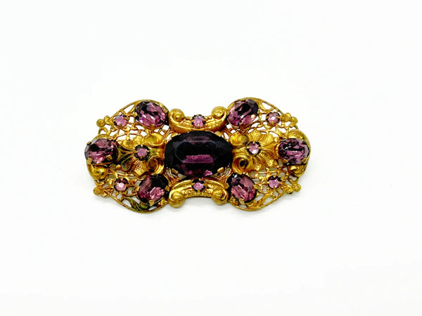 Dazzling 1930s Czech Purple Glass Filigree Brooch - Experience exquisite filigree craftsmanship with vibrant purple stones. Timeless vintage charm. Shop now!