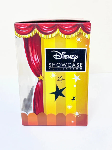 Perfect for Disney collectors: our Disney Showcase Collection World of Miss Mindy Queen of Hearts figurine provides unique artistry and villainous charm. Shop today!