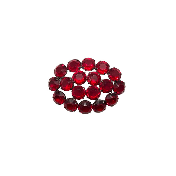 A cluster of round-cut dark red rhinestones arranged in an oval shape on a plain white background.