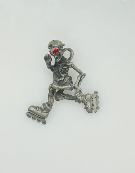 Skeleton with Red Eyes, on Rollerblades Pendant - Lamoree’s Vintage