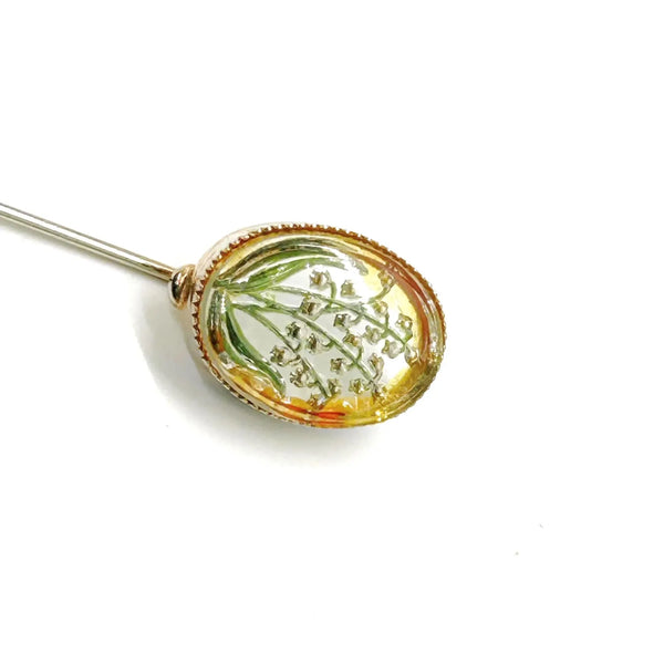 Perfect for vintage lovers: our "Lily of the Valley" Antique Essex Crystal Reverse Intaglio Stickpin provides exquisite floral artistry. Shop today!
