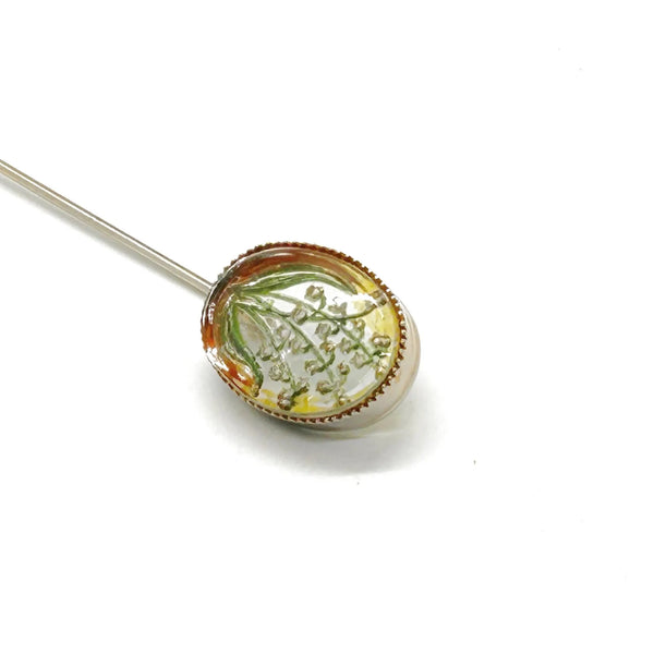 Perfect for vintage lovers: our "Lily of the Valley" Antique Essex Crystal Reverse Intaglio Stickpin provides exquisite floral artistry. Shop today!