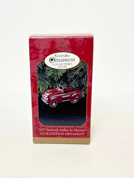 Perfect for collectors and pedal car fans: our Hallmark Keepsake Ornament: 1937 Steelcraft Airflow by Murray provides nostalgic, limited-edition charm. Shop today!
