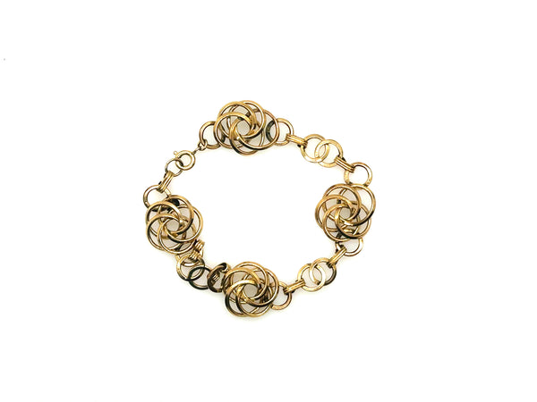 Vintage Gold Tone Multi-Ring Swirl Love Knot Bracelet & Screw Back Earrings Demi Parure Set