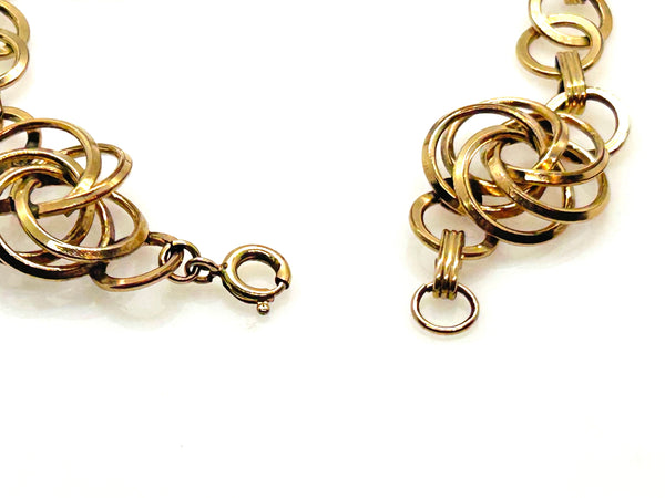 Vintage Gold Tone Multi-Ring Swirl Love Knot Bracelet & Screw Back Earrings Demi Parure Set