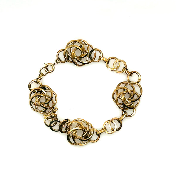Vintage Gold Tone Multi-Ring Swirl Love Knot Bracelet & Screw Back Earrings Demi Parure Set