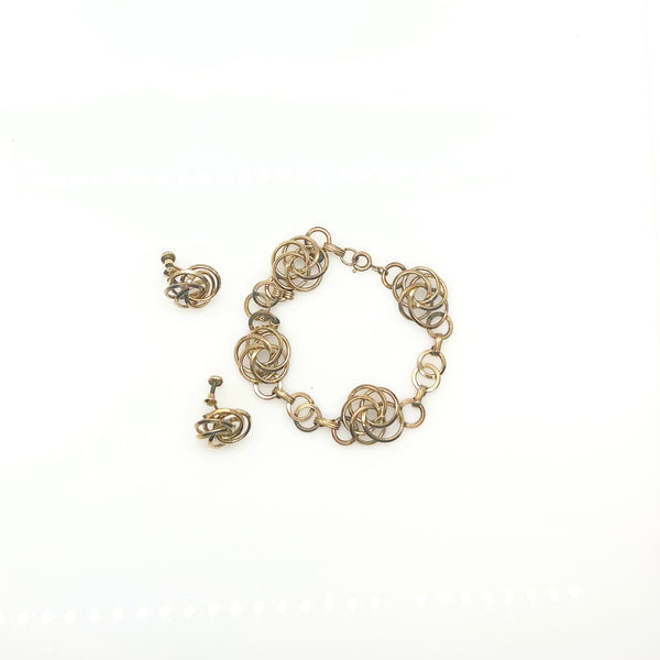 Vintage Gold Tone Multi-Ring Swirl Love Knot Bracelet & Screw Back Earrings Demi Parure Set