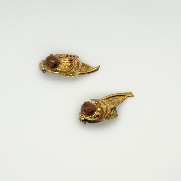 A pair of vintage goldstone earrings with brown cabochon gemstones, 