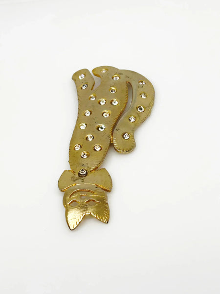 Get ready to add some playful pizzazz to your outfit with this tall kitty cat brooch! Measuring 4 1/2" tall, this gold tone cutie is signed Ultra Craft and studded with bright white rhinestones.