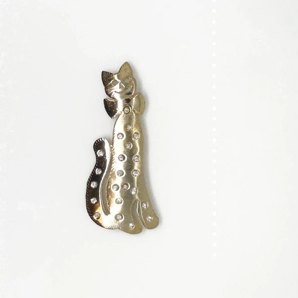 Get ready to add some playful pizzazz to your outfit with this tall kitty cat brooch! Measuring 4 1/2" tall, this gold tone cutie is signed Ultra Craft and studded with bright white rhinestones.