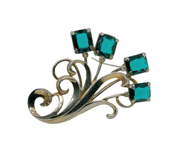 Perfect for vintage jewelry lovers: our Vintage Stylized Floral Brooch with Clear Green Square Stones provides vivid green stones and elegant retro charm. Shop today!