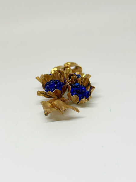 Vintage Floral Brooch with Intense Blue Stones - Lamoree’s Vintage