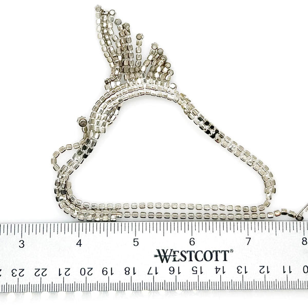 Perfect for vintage jewelry lovers: our Vintage Cascading Art Deco Style Rhinestone Necklace provides dazzling sparkle & elegant movement against a ruler for scale. Shop today!
